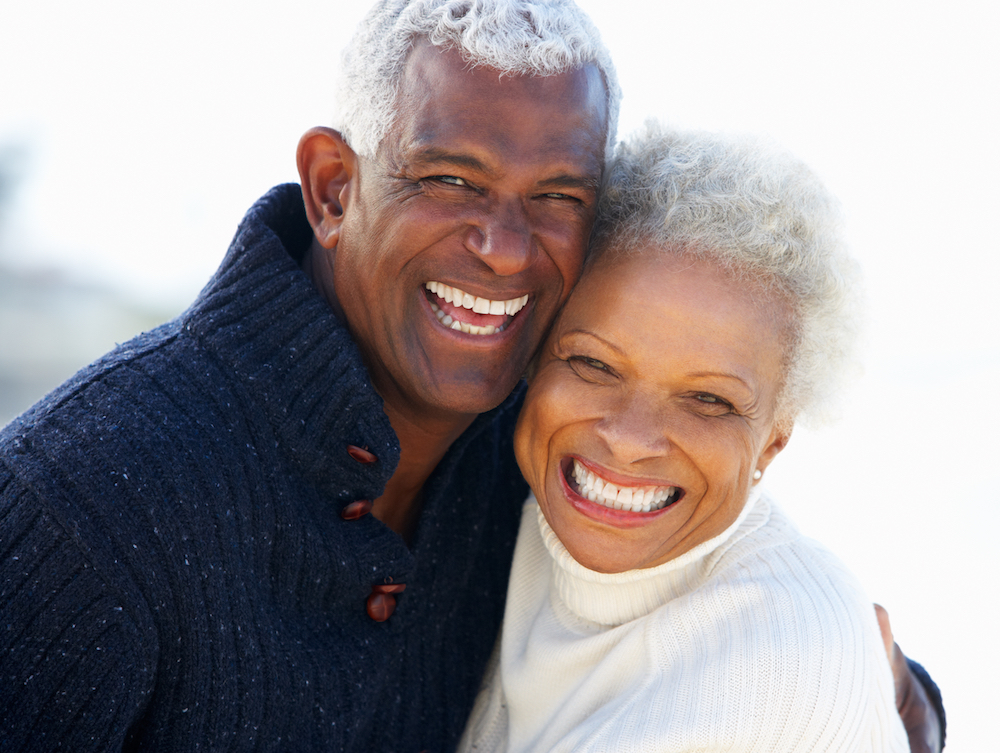 Happy hugging senior couple