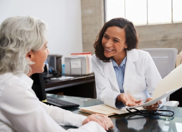 doctor chatting with a patient about treatment options